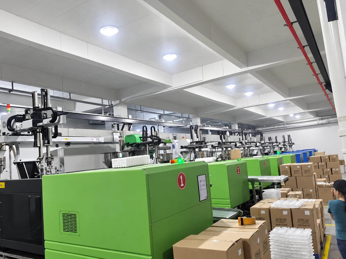 Injection molding machines in a Sanfeng production workshop