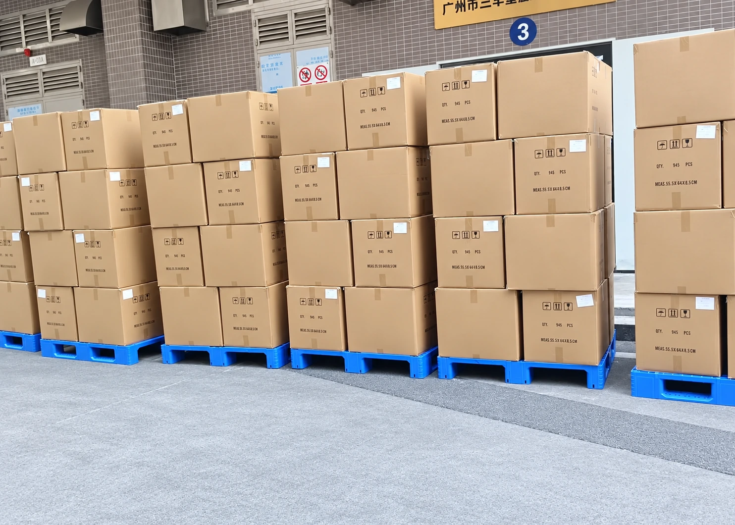Packed cartons arranged on pallets in the customer's warehouse